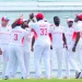 ON A ROLL: The T&T Red Force players celebrate one of two wickets for Anderson Phillip, centre, yesterday, second day of the West Indies Four-Day Championship fifth round match against the Barbados Pride at Kensington Oval, Bridgetown, Barbados.