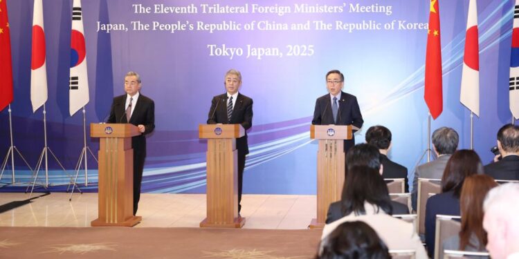 Chinese Foreign Minister Wang Yi, also a member of the Political Bureau of the Communist Party of China Central Committee, meets the press together with Japanese Foreign Minister Takeshi Iwaya and the Republic of Korea (ROK) Foreign Minister Cho Tae-yul after attending the 11th China-Japan-ROK Trilateral Foreign Ministers' Meeting in Tokyo, Japan, on March 22, 2025. (Xinhua/Jia Haocheng)