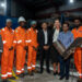 Several technicians pose with Dr. Singh, Ambassador Theriot and Director Persaud.
