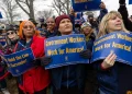 Members of the American Federation of Government Employees (AFGE) union protest against firings during a rally to defend federal workers in Washington, D.C., on Feb. 11, 2025.