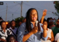 Amanza Walton Desir addressing a crowd