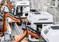 Robots work at an intelligent plant of truck manufacturer First Automotive Works Jiefang Co., Ltd. (FAW Jiefang) in Changchun, northeast China's Jilin Province, June 27, 2023. (Xinhua/Xu Chang)