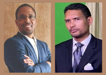 L-R Dr.Terrence Campbell, PNCR Treasurer Elson Low