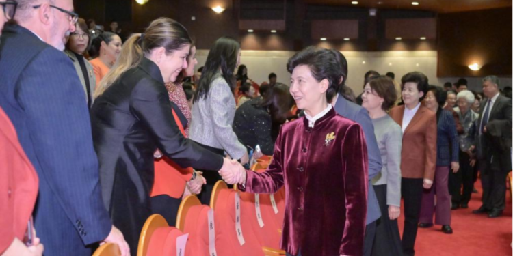 Chinese State Councilor and President of the All-China Women's Federation Shen Yiqin shakes hands with participants of a reception marking International Women's Day in Beijing, capital of China, March 7, 2025. /Xinhua