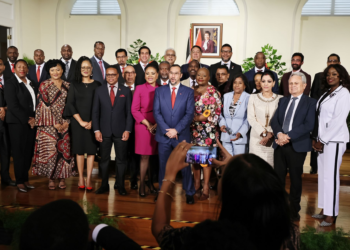 Prime Minister Stuart Young, centre, and members of his new Cabinet pose for a picture after the swearing-in ceremony. ABRAHAM DIAZ (T&T Guardian photo)