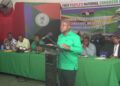 Leader of the PNCR, Aubrey Norton, at the podium (PNCR facebook photo)