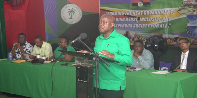 Leader of the PNCR, Aubrey Norton, at the podium (PNCR facebook photo)