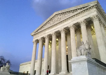 The Supreme Court at sunset in Washington, Feb. 13, 2016. (AP Photo/Jon Elswick, File)