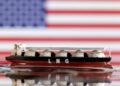 Model of LNG tanker is seen in front of the U.S. flag in this illustration taken May 19, 2022. REUTERS/Dado Ruvic/Illustration/File Photo Purchase Licensing Rights