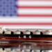Model of LNG tanker is seen in front of the U.S. flag in this illustration taken May 19, 2022. REUTERS/Dado Ruvic/Illustration/File Photo Purchase Licensing Rights