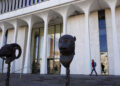 A woman walks by Princeton University's Woodrow Wilson School of Public and International Affairs is seen in Princeton, New Jersey, November 20, 2015. REUTERS/Dominick Reuter/File Photo Purchase Licensing Rights