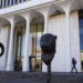 A woman walks by Princeton University's Woodrow Wilson School of Public and International Affairs is seen in Princeton, New Jersey, November 20, 2015. REUTERS/Dominick Reuter/File Photo Purchase Licensing Rights