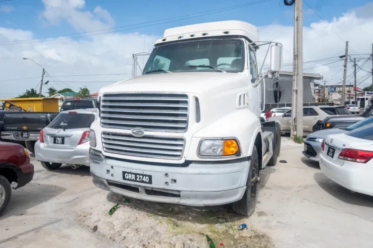 Truck encumbering the roadway