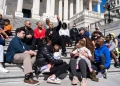 From left, House Minority Leader Hakeem Jeffries, D-N.Y., Maya Wiley, president of the Leadership Conference on Civil and Human Rights, and Sen. Cory Booker, D-N.J., conduct a live-streamed conversation with Americans focused on "our common values, our faith traditions and the moral moment facing our nation," on the House steps of the U.S. Capitol on Sunday, April 27, 2025. Tom Williams/CQ-Roll Call, Inc./Getty Images
