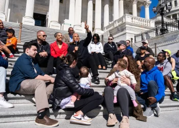 From left, House Minority Leader Hakeem Jeffries, D-N.Y., Maya Wiley, president of the Leadership Conference on Civil and Human Rights, and Sen. Cory Booker, D-N.J., conduct a live-streamed conversation with Americans focused on "our common values, our faith traditions and the moral moment facing our nation," on the House steps of the U.S. Capitol on Sunday, April 27, 2025. Tom Williams/CQ-Roll Call, Inc./Getty Images