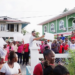 A group of PPP protesters outside of a meeting being held by Azzuddin Mohamed (Stabroek News photo)