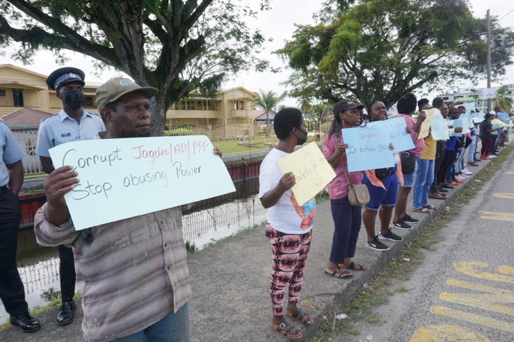 (Photos from May 2022 protest by concerned citizens in front of SOCU HQ (Camp St) during Winston Jordan's previous arrest).