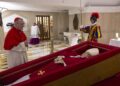Cardinal Pietro Parolin, who served as Pope Francis' secretary of state, stands by the pope's coffin in the chapel of his residence, the Domus Sanctae Marthae, at the Vatican April 21, 2025. (CNS photo/Vatican Media)