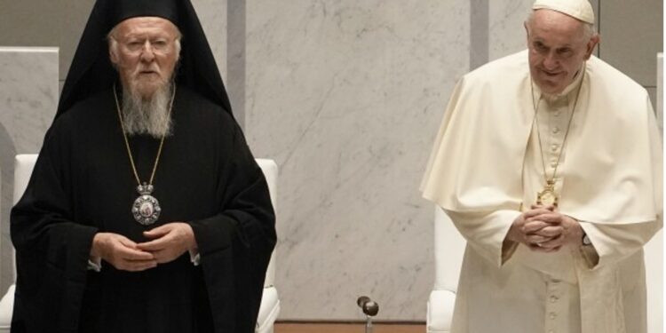 Pope Francis and Ecumenical Patriarch Bartholomew attend an ecumenical meeting and prayer for peace in Our Lady of Arabia Cathedral, Sakhir, Bahrain, Friday, Nov. 4, 2022. (AP Photo/Alessandra Tarantino, File)