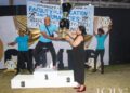 Vice-Chancellor Professor Paloma Mohamed Martin hands over the trophy to the winners from the Faculty of Education and Humanities, on the second day of the University’s Inter-Faculty Track and Field Championships