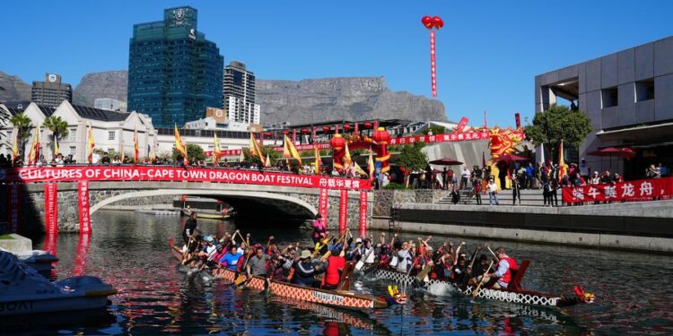 Dragon boat teams take part in a 1,500-meter race during the Dragon Boat Festival in Cape Town, South Africa, May 24, 2025. (Xinhua/Wang Lei)