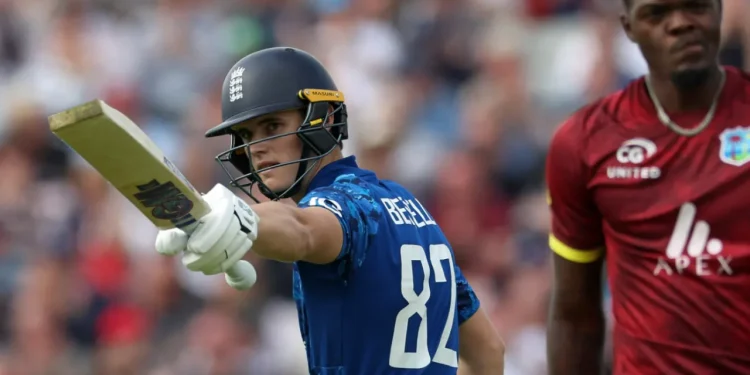 Jacob Bethell salutes the dressing-room after his half-century  •  Getty Images