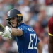 Jacob Bethell salutes the dressing-room after his half-century • Getty Images