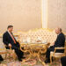 President Xi Jinping and Russian President Vladimir Putin have a chat over tea in Moscow on Thursday. XIE HUANCHI/XINHUA