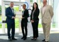 Kalyca Fraser receiving her certificate from Thomas Bach IOC president