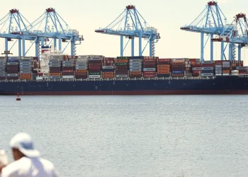 A container ship is moored at the port of the port of New York & New Jersey in Elizabeth, NJ on May 12. Matt Rourke/AP