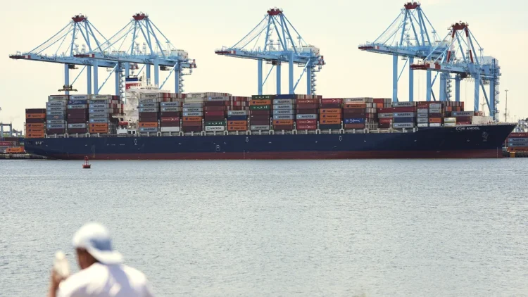 A container ship is moored at the port of the port of New York & New Jersey in Elizabeth, NJ on May 12. Matt Rourke/AP
