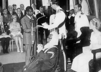 The Duke of Kent handing over the Independence constitutional documents to Prime Minister Burnham