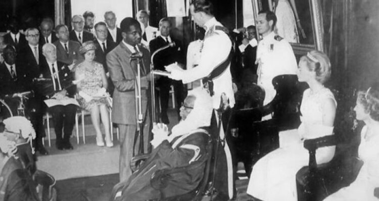 The Duke of Kent handing over the Independence constitutional documents to Prime Minister Burnham