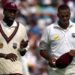 Sir Curtly Ambrose (L) and Courtney Walsh (R), of the West Indies, walk together during the first session of the Fifth Test against England at The Oval in London, 31 August 2000.