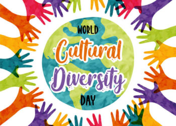 World Cultural Diversity Day greeting card illustration of colorful people hands raised up together. International culture social help concept. 21 may ethnic celebration holiday design.  (Istock photo)