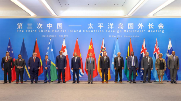 Chinese Foreign Minister Wang Yi, also a member of the Political Bureau of the Communist Party of China Central Committee, co-hosts the Third China-Pacific Island Countries Foreign Ministers' Meeting with Kiribati's President and Foreign Minister Taneti Maamau in Xiamen, southeast China's Fujian Province, May 28, 2025. /Xinhua