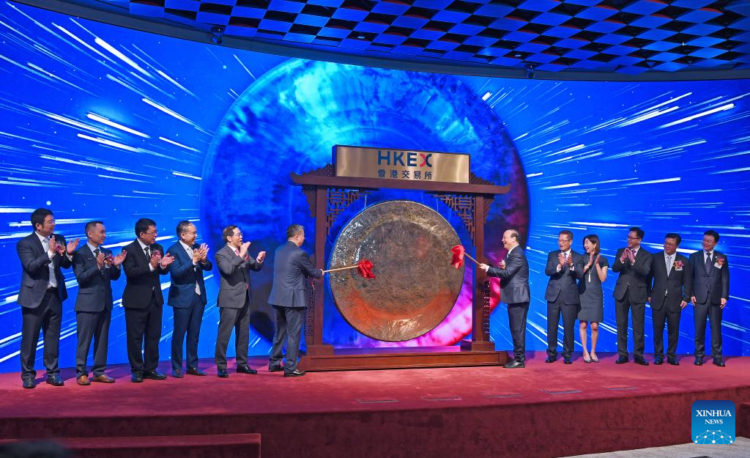 Guests attend the listing ceremony of Chinese electric vehicle (EV) battery maker Contemporary Amperex Technology (CATL) at the Hong Kong Stock Exchange in south China's Hong Kong, May 20, 2025. CATL was listed on the Hong Kong Stock Exchange on Tuesday, with the stock code 3750. (Xinhua/Chen Duo)