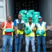 Packed and ready to go. (L-R) Production Manager, Chockalingam Ramasamy; Warehouse Attendants, Krachike Lyn, Shaquile Drummond, Prince Ellis and Phillip Lyons; and Warehouse Manager, Daniel Chambers, prepare the first shipment of Omni’s products to Guyana.