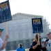 Supporters hold signs as they gather outside the U.S. Supreme Court on April 30, 2025, in Washington. Alex Wong/Getty Images