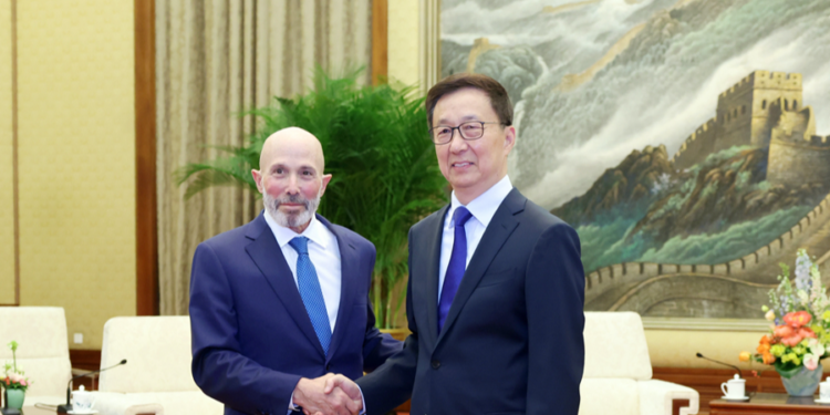 Chinese Vice President Han Zheng (R) shakes hand with a member of a U.S. delegation attending the China-U.S. Senior-Level Track Two Dialogue in Beijing, China, June 5, 2025. /Xinhua