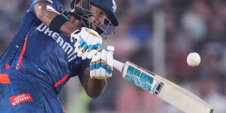 Lucknow Super Giants' Nicholas Pooran plays a shot during the Indian Premier League cricket match between Gujarat Titans and Lucknow Super Giants at Narendra Modi Stadium in Ahmedabad, India, on May 22, 2025. - AP Photo