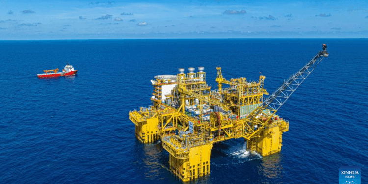 An aerial drone photo taken in April, 2025 shows the Deep Sea No. 1 energy station, in south China's island province of Hainan. China National Offshore Oil Corporation (CNOOC) announced Wednesday the full operation of the second phase of its flagship gas field in the South China Sea, marking the completion of the country's largest offshore natural gas development to date. The progress brings the gas field, named Shenhai Yihao or Deep Sea No. 1, to its designed production capacity of 4.5 billion cubic meters annually, according to CNOOC, the largest offshore oil and gas producer in China. (CNOOC/Handout via Xinhua)
