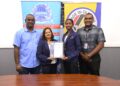 Aquafina Director, Nalini Latchana receives Made in Guyana Certificate from GNBS Technical Officer, Rachel Cecil