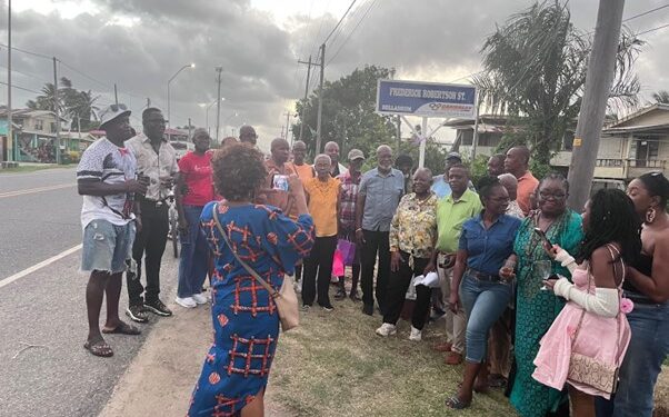 A gathering at the unveiling of the Frederick Robertson Street