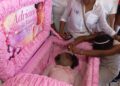 11-Y-O Adriana Younge laying in the casket