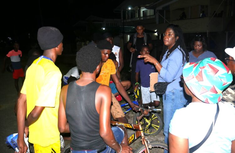 Presidential candidate Amanza Walton-Desir (centre) on the campaign husting, speaking to young people at an East Berbice-Corentyne outreach