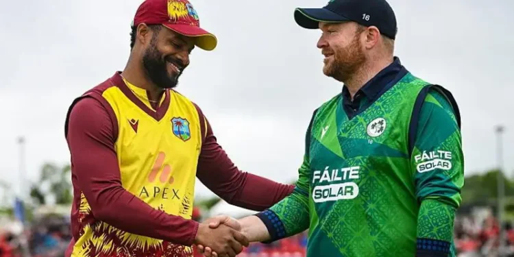 Ireland's Paul Stirling shakes hands with West Indies counterpart Shai Hope