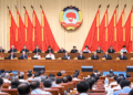 Wang Huning, a member of the Standing Committee of the Political Bureau of the Communist Party of China (CPC) Central Committee and chairman of the Chinese People's Political Consultative Conference (CPPCC) National Committee, attends the opening meeting of the 12th session of the Standing Committee of the 14th CPPCC National Committee under the theme deepening economic reforms in Beijing, capital of China, June 23, 2025. (Xinhua/Zhang Ling)