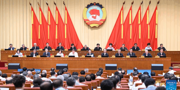 Wang Huning, a member of the Standing Committee of the Political Bureau of the Communist Party of China (CPC) Central Committee and chairman of the Chinese People's Political Consultative Conference (CPPCC) National Committee, attends the opening meeting of the 12th session of the Standing Committee of the 14th CPPCC National Committee under the theme deepening economic reforms in Beijing, capital of China, June 23, 2025. (Xinhua/Zhang Ling)