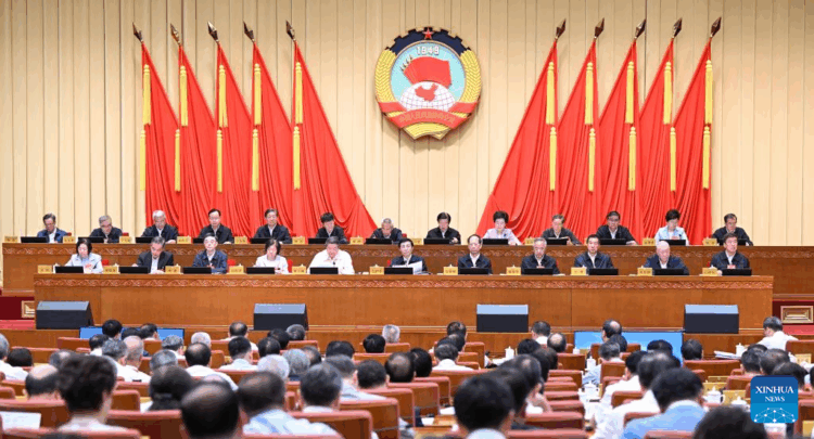 Wang Huning, a member of the Standing Committee of the Political Bureau of the Communist Party of China (CPC) Central Committee and chairman of the Chinese People's Political Consultative Conference (CPPCC) National Committee, attends the opening meeting of the 12th session of the Standing Committee of the 14th CPPCC National Committee under the theme deepening economic reforms in Beijing, capital of China, June 23, 2025. (Xinhua/Zhang Ling)